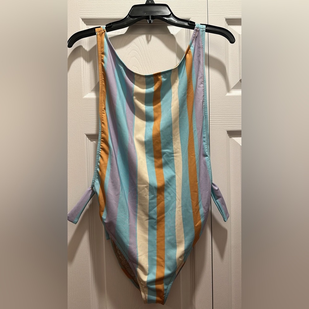 Free People. The Pamela printed one piece Swimsuit